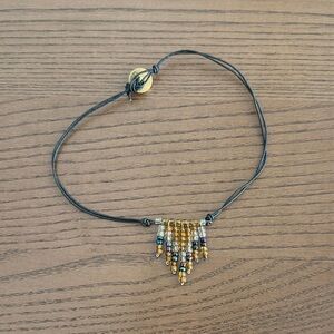 Leather and beaded choker necklace
